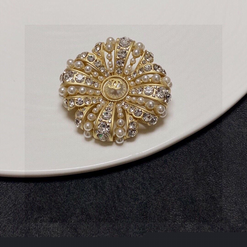 Ch*el brooches